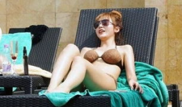 洪真英资料,音乐才女的多面人生与艺术成就